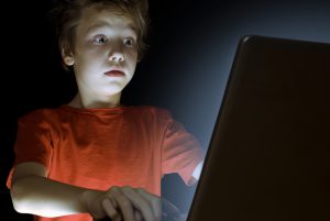 Kid-on-laptop-with-shocked-face-300x201.jpg