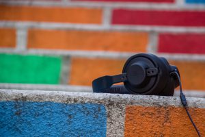 live stream podcast headphones on a wall